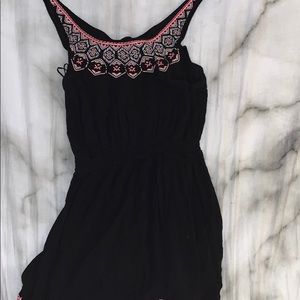 Black dress with pink and white pattern at the top
